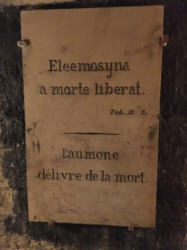 catacombs latin french paris skull death ossuary