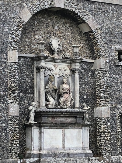 A memorial with mourning cherubs by Francis Bird