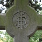 IHS dollar symbol cemetery graveyard memorial headstone