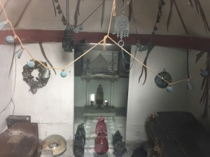 inside the Burton mausoleum showing coffins, lanterns, and Arab lamps
