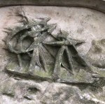 A ship on stormy seas carved into memorial tomb in West Norwood Cemetery