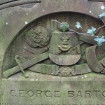 soldiers sword and hat and belt symbol carved on gravestone in nunhead cemetery